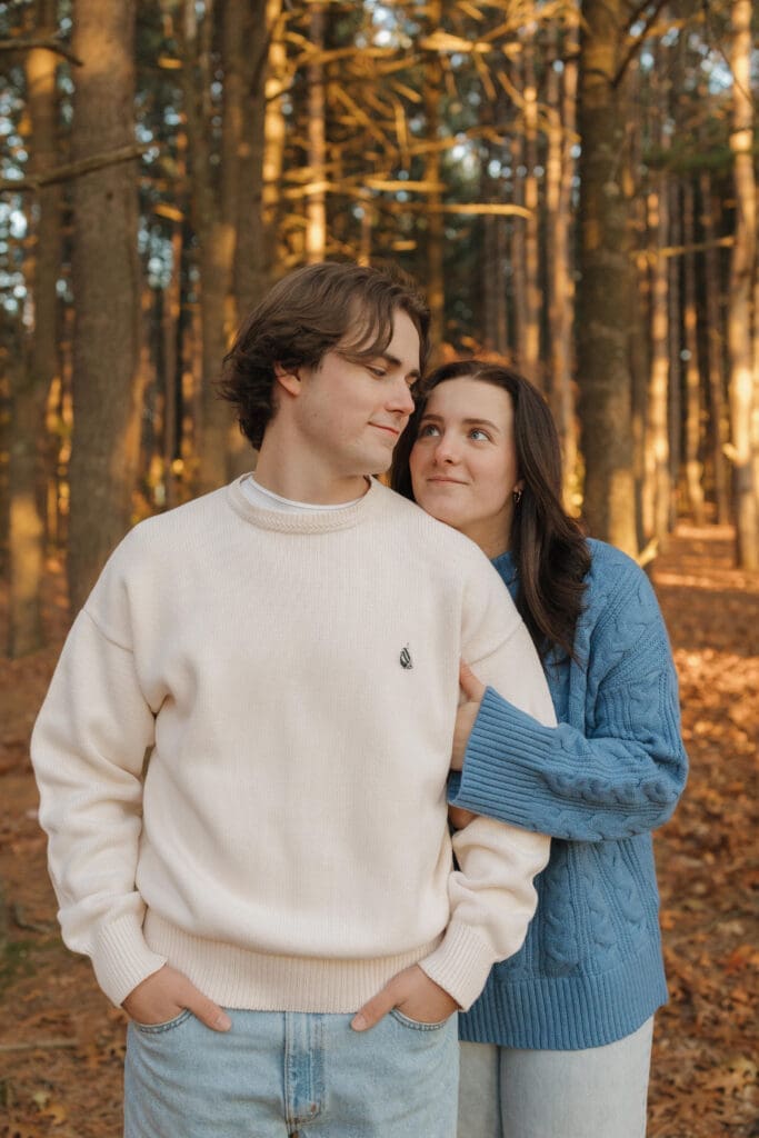 Provin Trails fall couples session in Grand Rapids Michigan with couple in forest during golden hour autumn colors